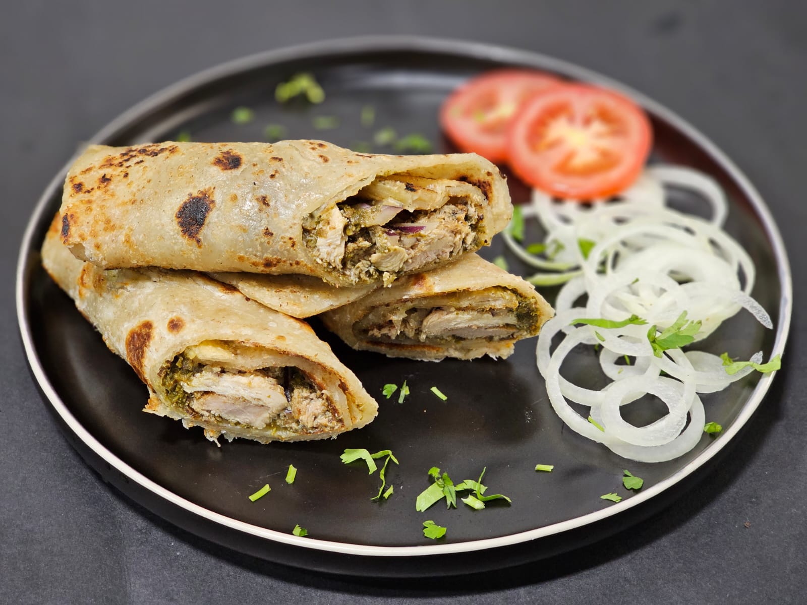 Shawarma Roll served with Spring onions and Tomatoes
